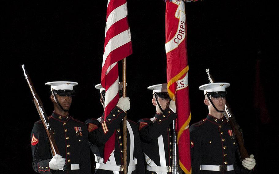 Obamas attend evening parade at Marine Barracks Washington Stars